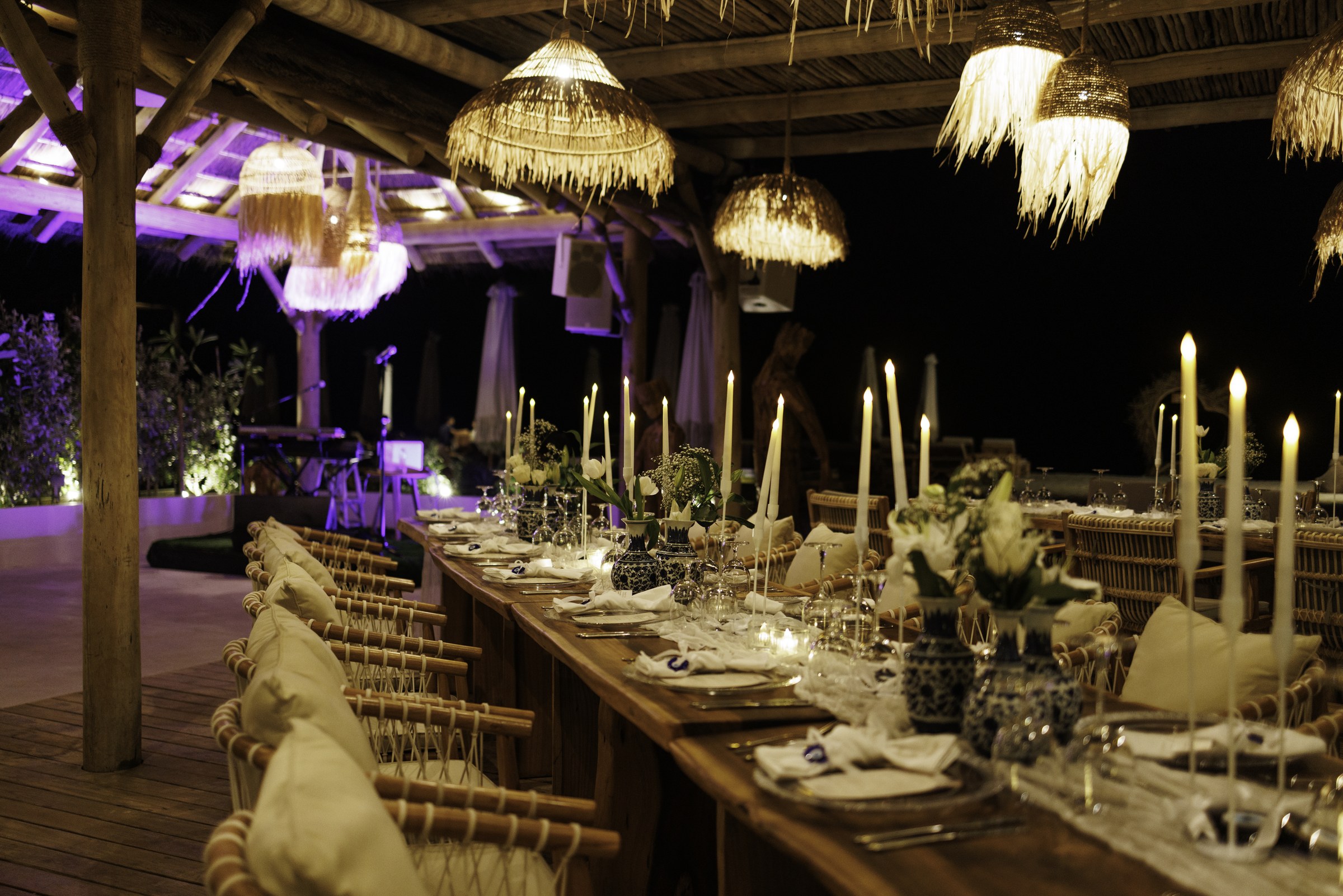 Candlelit event table at night